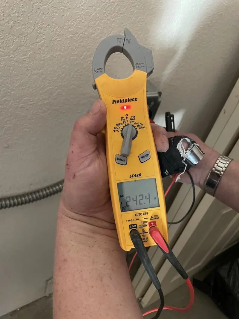 Voltage testing with clamp meter during Aluminum Wiring Replacement in Nags Head